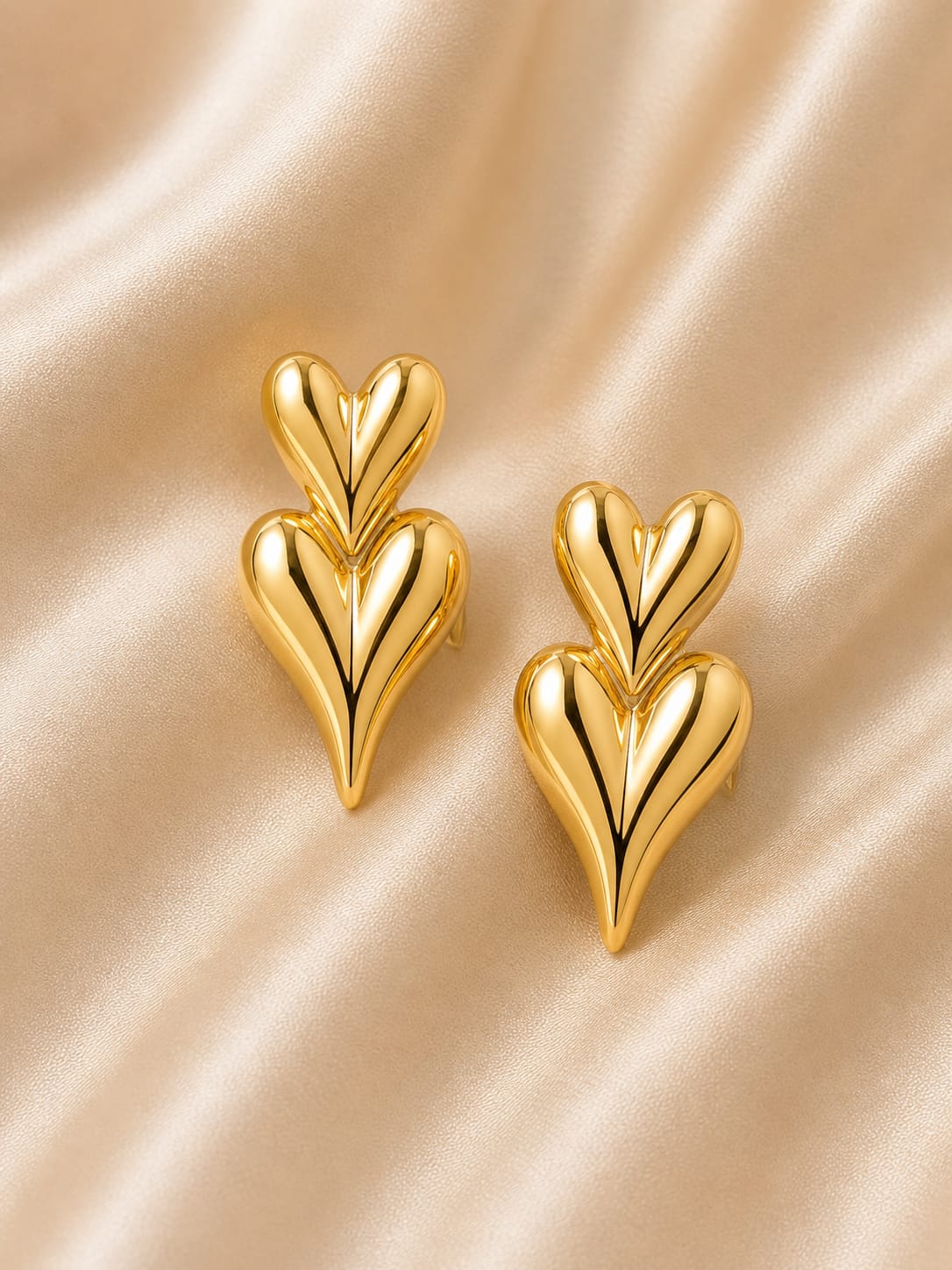 Golden double hearted earrings